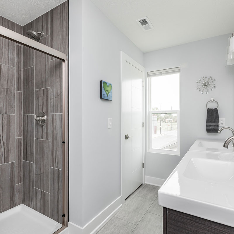 custom bathroom design by HE Homes